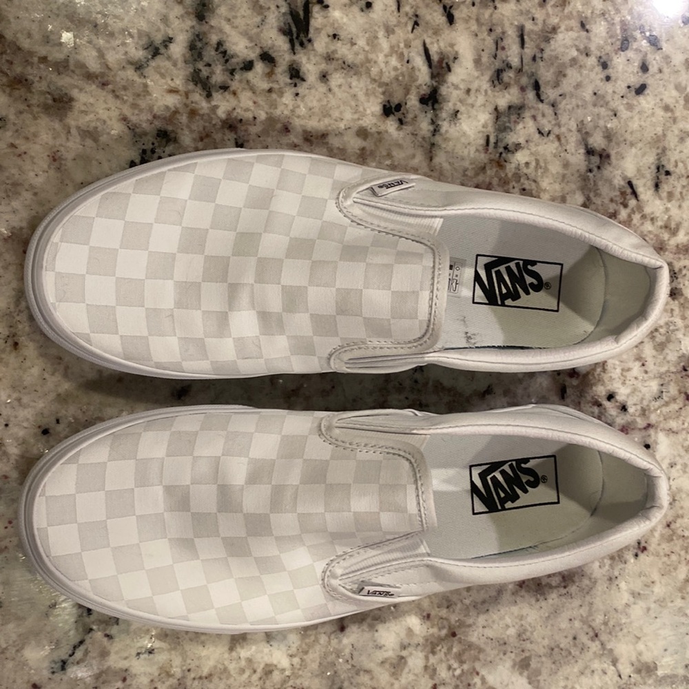 Size 10 Vans white checkered slip ons.  Worn once